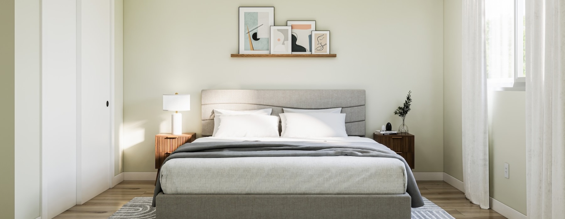 bedroom with a large window and bed