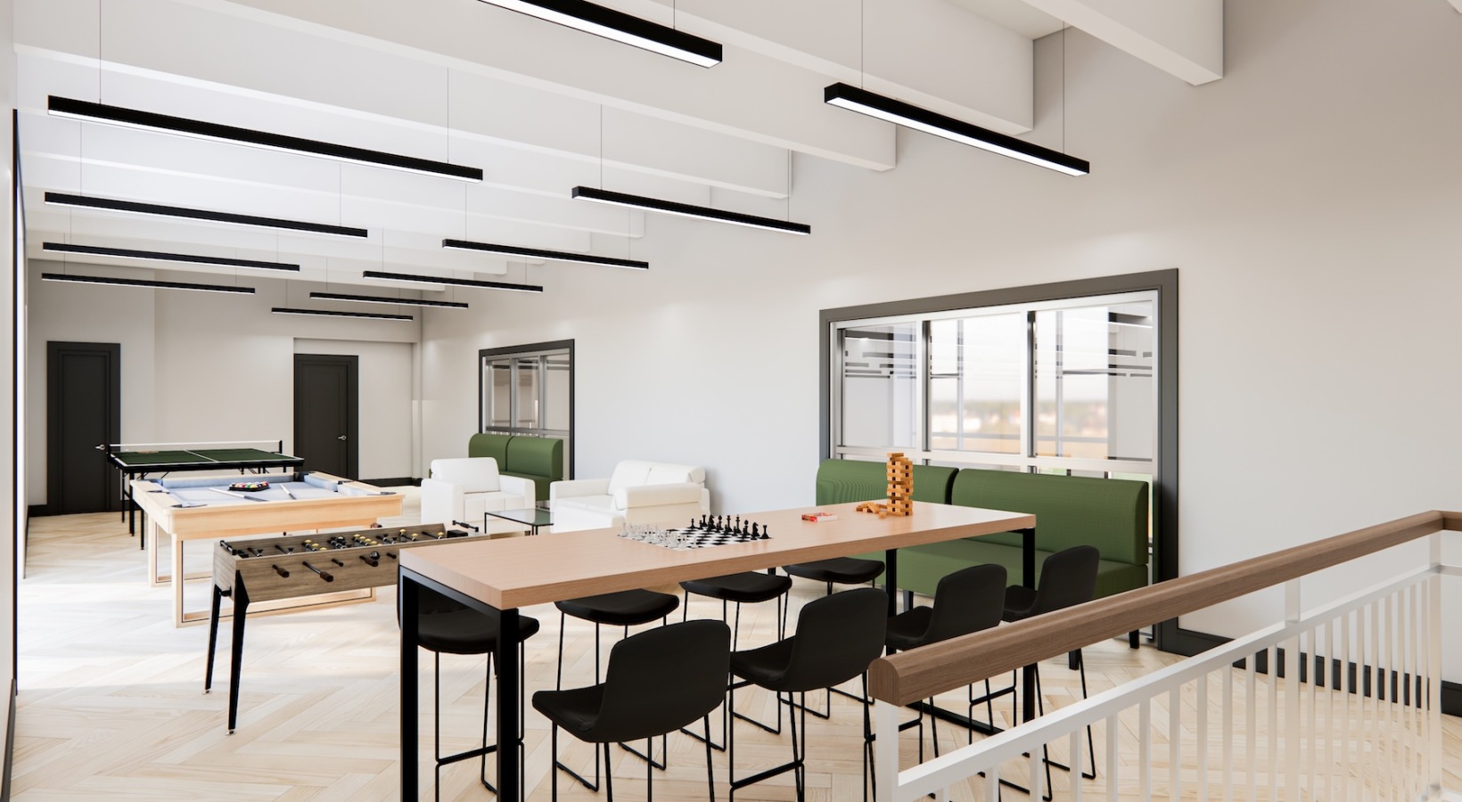 a room with tables and chairs and foos ball